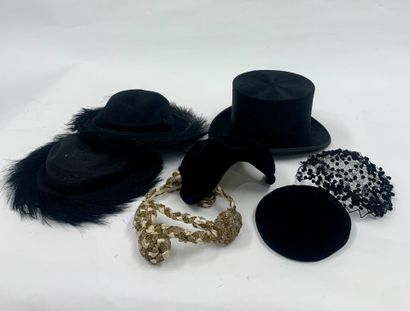 null Lot of early 20th century hats including:
- Two black hats with black feathers,...