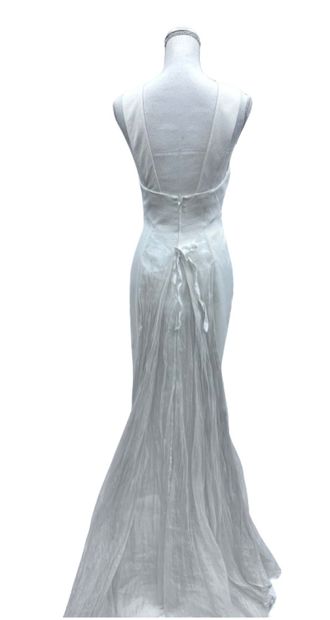 THIERRY MUGLER White cotton piqué halter dress with tulle train
Size 40

Very good...