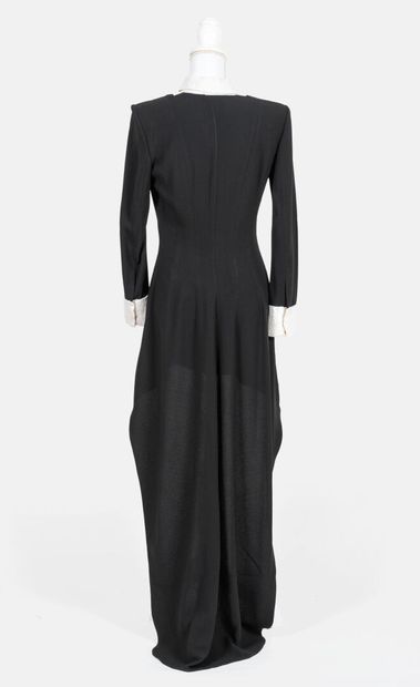 SAINT LAURENT Black dress with tails and long sleeves, white sequined collar, bib...