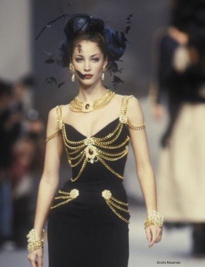 CHANEL HAUTE COUTURE Black silk crepe sheath dress with chains, Spring-Summer 1992

A...