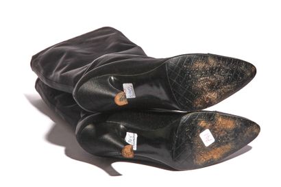 CHANEL Paire de bottes en satin noir, circa 1996

A pair of black satin knee high...