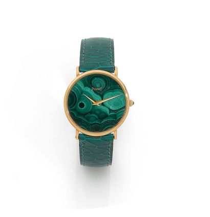 PIAGET PIAGET

Montre bracelet de dame en or 18K, fond en plaque de malachite, index...