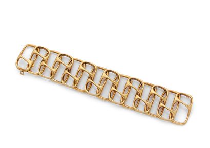 null Bracelet articulé en or 18K composé d'une suite de motifs oblongs imbriqués,...