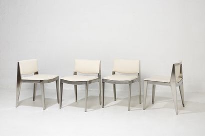ANNÉES 1970 YEARS 1970

A set of four chairs, steel structure, compass base at the...
