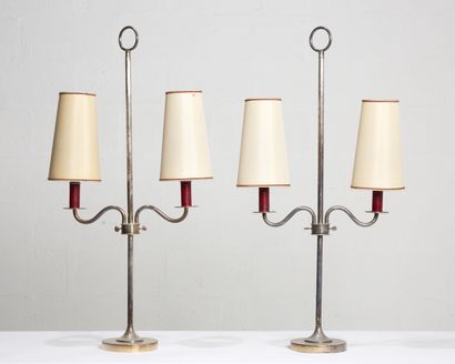 ANNÉES 1970 YEARS 1970

A pair of two-light silver-plated metal lounge lamps, circular...