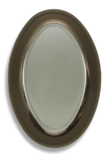 ANNÉES 70 70'S

Large oval mirror, smoked glass frame with large bevels.

Large oval...