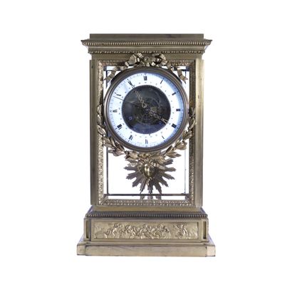 PENDULE CAGE EN BRONZE CISELÉ DORÉ, STYLE LOUIS XVI Clock cage in gilded bronze,...