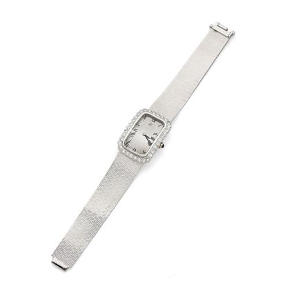 UTI UTI
Lady's wristwatch in 18K white gold, circa 1970, oblong dial decorated with...