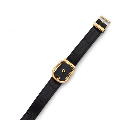 HERMÈS « CEINTURE » HERMES "BELT
Lady's wristwatch in 18K gold (750 thousandths),...