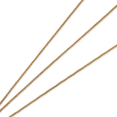 SAUTOIR Long 18K gold necklace, articulated with twisted lapidary links.
A long 18K...