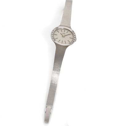 ORBI ORBI
Lady's watch in 18K (750 thousandths) white gold, circa 1960, silvered...