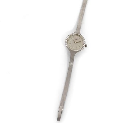 ORBI ORBI
Lady's watch in 18K (750 thousandths) white gold, circa 1960, silvered...