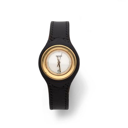 HERMÈS HARNAIS HERMÈS HARNAIS
Steel and gold-plated ladies' wristwatch, circa 2000,...