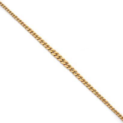 COLLIER Necklace in 18K gold, articulated with falling gourmette links.
An 18K gold...