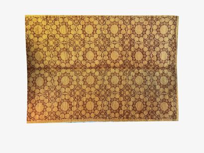 null TISSAGEMECANIQUE 

Carpet with yellow background and brown patterns, decorated...