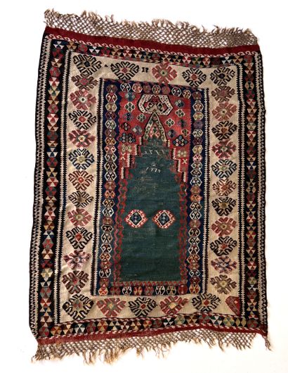 null RUGS OF THE EAST 

Kilim carpet with multicolored tones. Green mirhab decoration,...