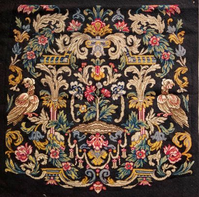 null EMBROIDERY AT POINT

Small panel with black background and multicolored motifs,...