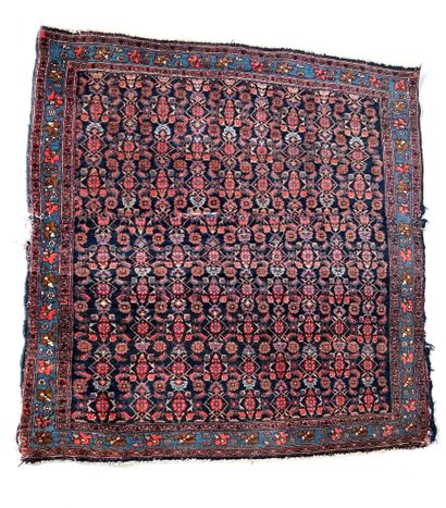 null RUGS OF THE EAST 

Veramin carpet, red, purple and blue tones, floral border....