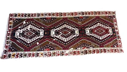 null RUGS OF THE EAST 

Kilim carpet, brown, green, red and beige tones. Decorated...