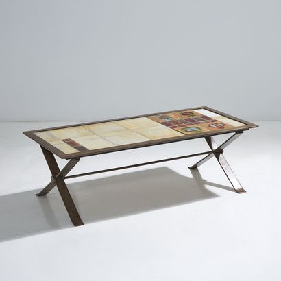 ANNÉES 1970 YEARS 1970
A rectangular coffee table with patinated and varnished metal...