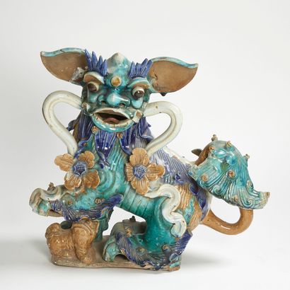 INDOCHINE, VERS 1900 INDOCHINA, CIRCA 1900
Blue and green enameled terracotta group...
