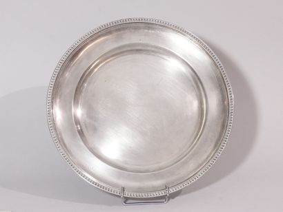
 Round silver 
dish, the edge decorated...