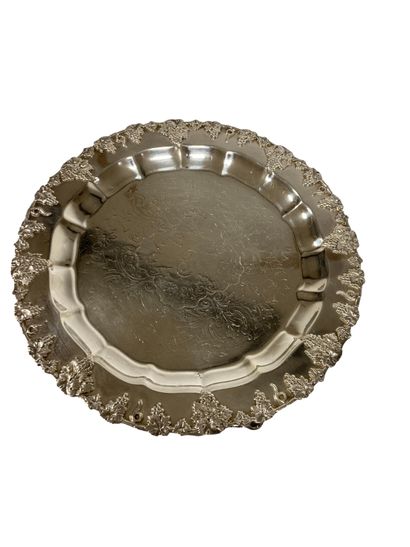 null Silver plated display dish with vine decorations on the wing. Figured P in a...