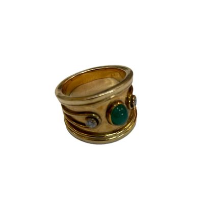 null Gold ring 14k 585/°° decorated with a green cabochon and two small white stones
A...