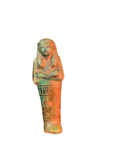 null Mummiform ouschebti inscribed in hieroglyphic characters painted on four registers...