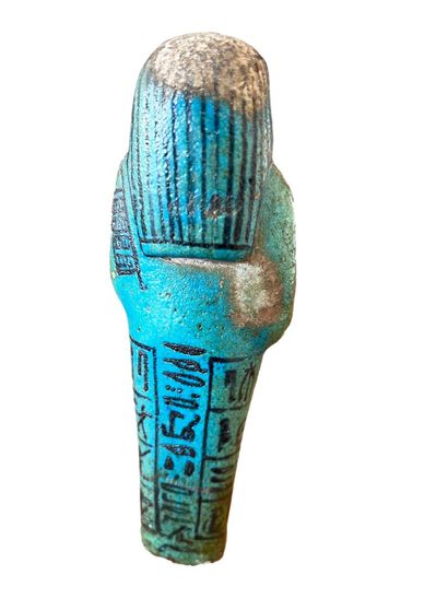 null Mummiform ouschebti inscribed in hieroglyphic characters painted on four registers...