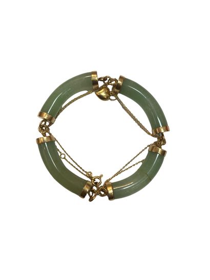 null Articulated bracelet in 18k gold with jade decoration
Pb: 23 gr
