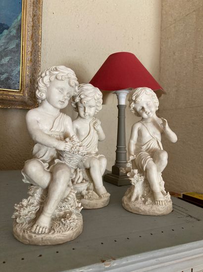 null Set including three resin subjects with putto decorations and two turned wooden...