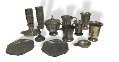 null Set in pewter including a sugar bowl, three timables on footouche two mugs,...