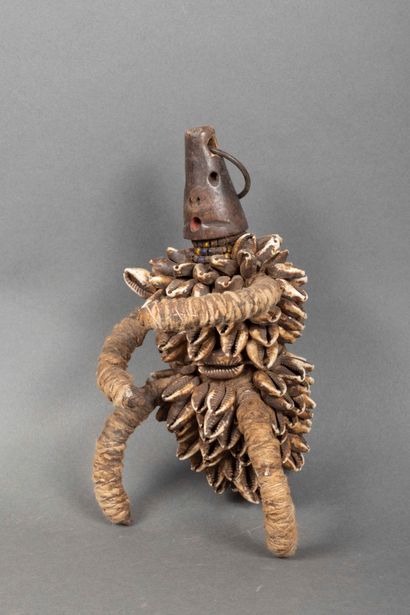 Fali doll, Cameroon, 

Wood, leather, cowrie...