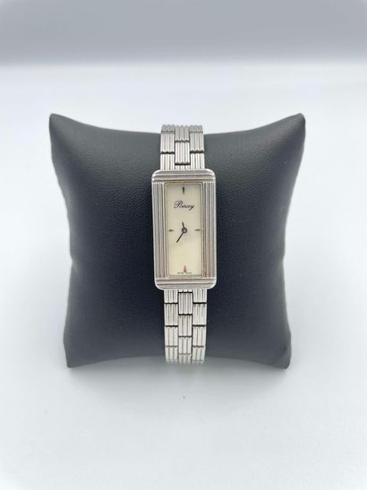 null POIRAY, 

Lady's wristwatch model Ma Première in steel, bezel with gadrooned...