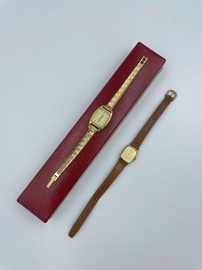 null Lot including: 

- OMEGA, gold-plated watch, quartz movement, 27 x 19 mm. 

-...