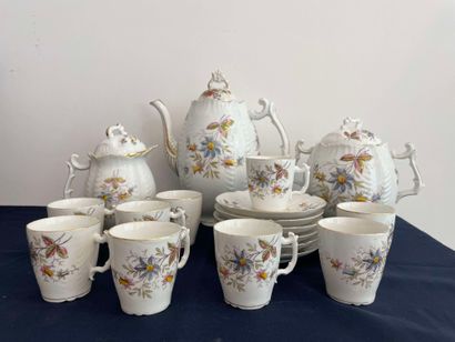 null Part of coffee service in white porcelain with floral decoration including a...