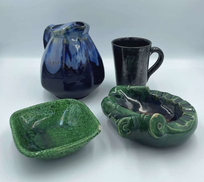 null Lot including : 

- ANNECY, a pitcher in blue glazed earthenware, H. 16 cm....