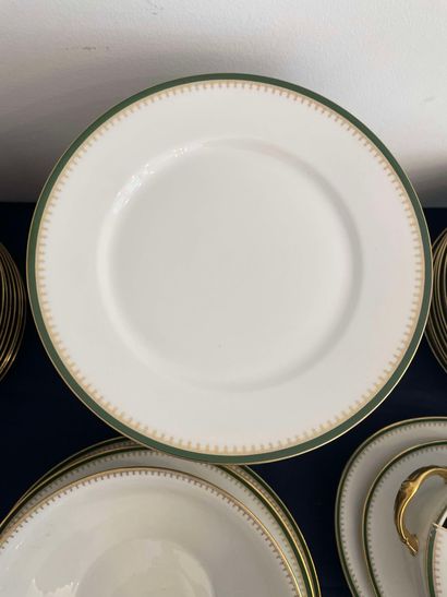 null LIMOGES : 

Important table service in white porcelain decorated with a green...