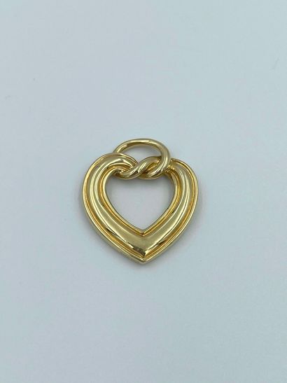 BOUCHERON, 

Heart-shaped pendant in 18K...