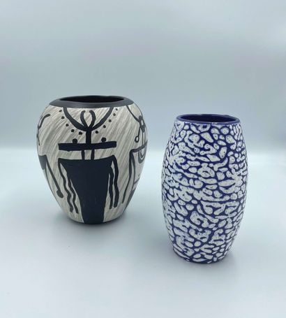 null Set of two small ceramic vases, one with stylized zoomorphic characters in black...