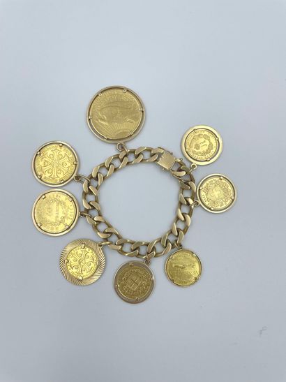 null Bracelet in yellow gold 18 carats (750 ) with in tassels : 1 coin of 20 dollars...