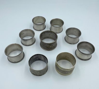 null Lot including six napkin rings in metal with frieze of gadroons and three napkin...