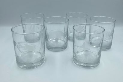 null Suite of six glass water glasses with engraved decoration of tropical fish.
