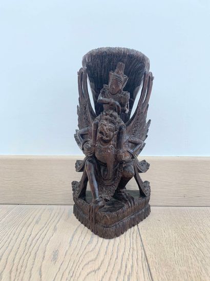 null Vishnu riding Garuda.

Sculpture in exotic wood.

Indonesia, 20th century.

H....