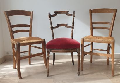 null Lot including :

- Suite of four chairs in natural wood, reversed back with...