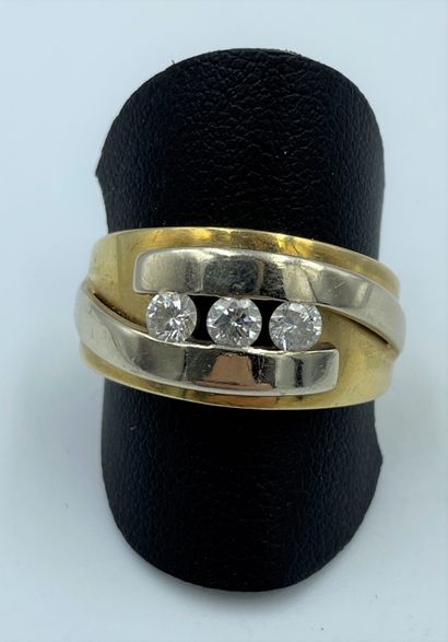 null Bague jonc en or jaune et gris 18 carats (750 millièmes) sertie de trois diamants...