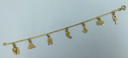 null Bracelet souple en or jaune 18 carats (750 milliièmes) orné de petites breloques...