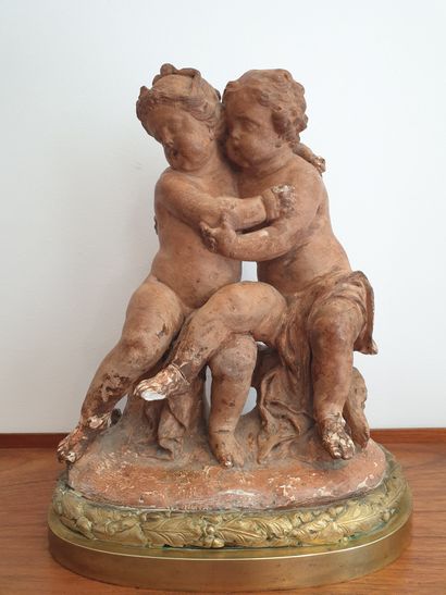null A terracotta group representing two children. Gilt bronze base
H. 35 cm
(Damage,...