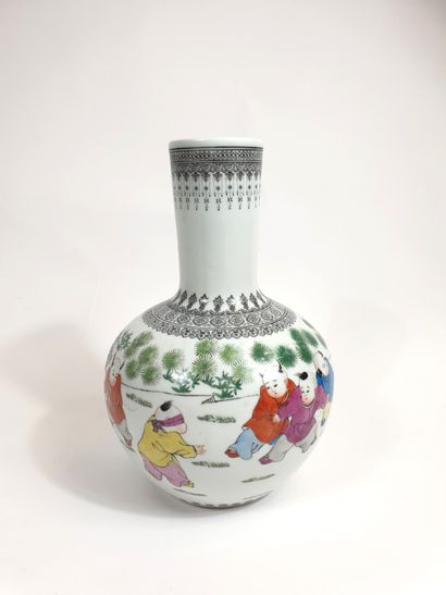 null Ball-shaped porcelain vase with narrowed neck decorated with children playing...